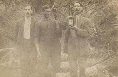 Three Unknown Men - Possibly Rev. John Allen Ellis on the left. 