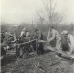 Otto Tift and others sawing wood near Dover