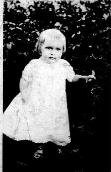 Little Girl in White Dress
