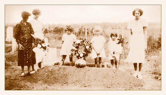 At the graveside of Claude Smoot, 
Warren County Tennessee, 1936. Photograph provided by Angela Mayfield